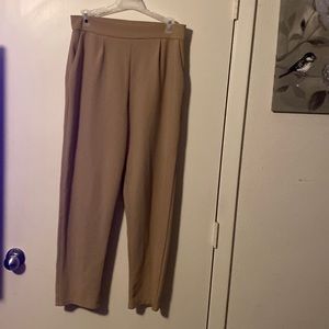 Khaki colored size large slacks.